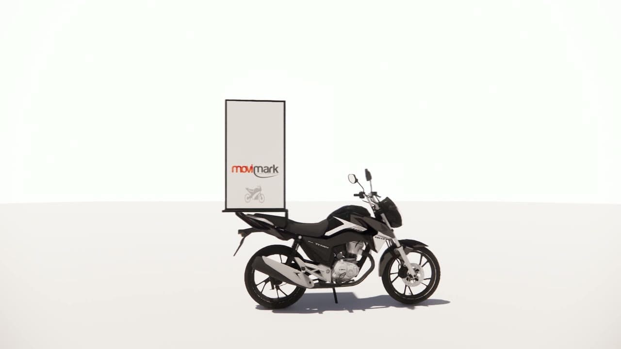 Moto valla de Movimark con una valla publicitaria vertical